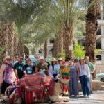 Group-Shot-with-Camel-and-Palms-150x150